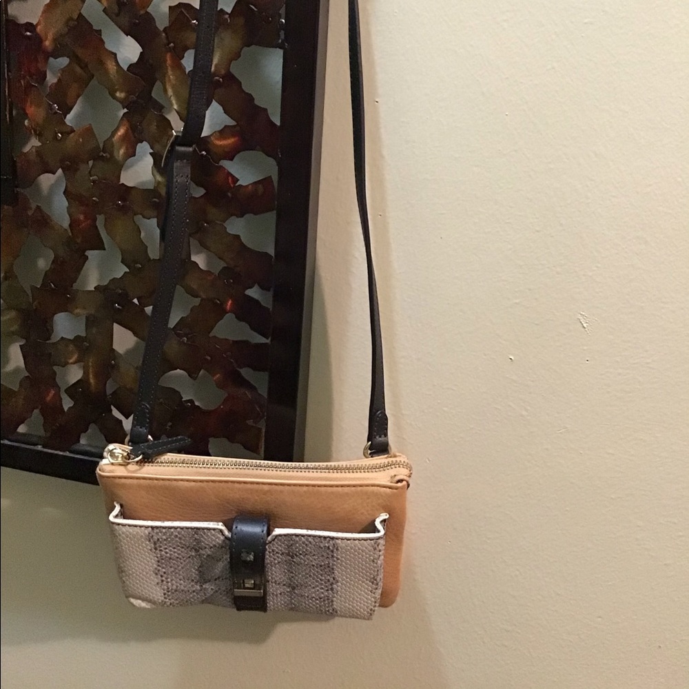 Crossbody bag 2 compartments credit card slots.